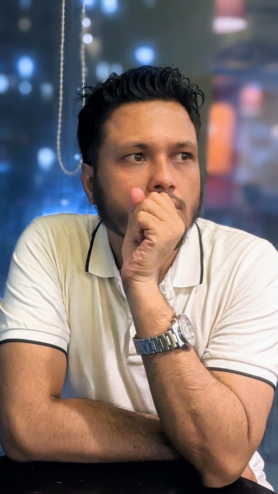 Javed Rasin looking up into the sky